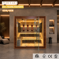 PLOUTARA Cabines de sauna infrarouge lointain d'intérieur avec quatre radiateurs verticaux et façade entièrement vitrée, OEM ODM pour projets hôteliers et de bien-être
