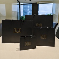 Sac de shopping en papier couché personnalisé pour le commerce de détail, sac cadeau de luxe avec poignées, emballage imprimé avec logos