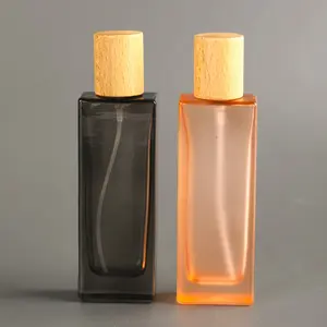 Kare parfüm şişesi 50ml üçgen özel renk Amber pembe düz cam bambu kap parfüm şişeleri