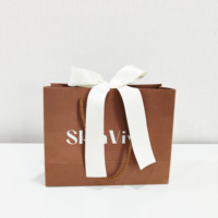 Sac en papier d'emballage spécial, sac cadeau de luxe personnalisé avec poignée, sac en papier d'emballage pour les achats professionnels