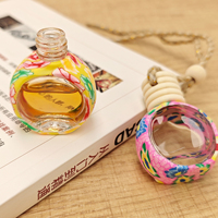 Vente en gros de diffuseur d'arôme de voiture suspendu en bois de 6ml 8ml 10ml bouteille de parfum transparente avec bouchon en bois vis joint désodorisant pour voiture