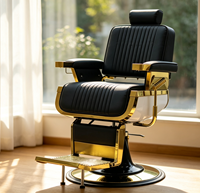 Fauteuil de barbier de luxe rétro avec cadre en métal plaqué or noir, coutures verticales, inclinable hydrauliquement