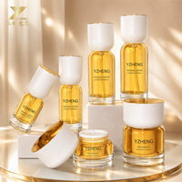 Ensemble d'emballages cosmétiques de luxe personnalisés avec des flacons et des pots en verre rose mat de 30 ml/50 g pour les soins de la peau (pompe à lotion/sérum)