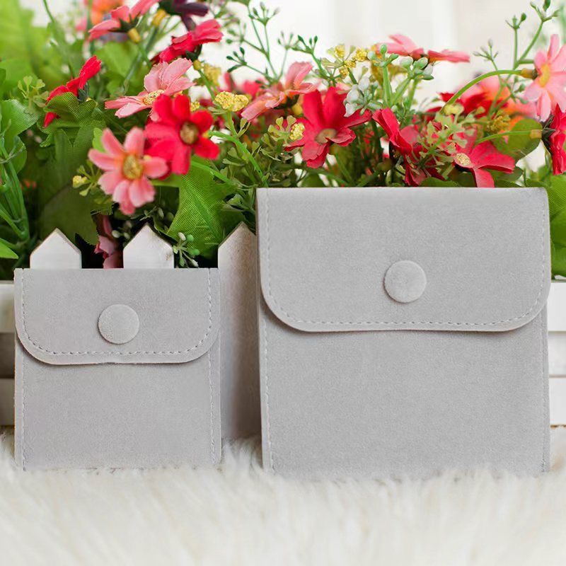 Bolsa de joyería de terciopelo gris