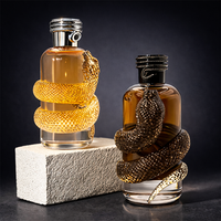 Nouveau design, vente en gros, flacon de parfum vide en verre transparent en forme de serpent, 100 ml, 150 ml, avec boîte