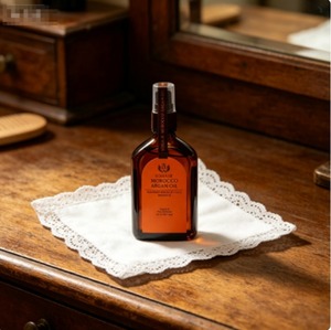 Esencia de Doble Cuidado con Aceite de Argán de Marruecos 100ml, Sérum Capilar No Pegajoso para Puntas Abiertas, Protector de Calor, Exportación a Granel - Product Image 1