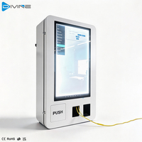Idées d'affaires à faible investissement : Distributeur automatique mural intelligent de préservatifs de 32 pouces avec écran LCD pour adultes