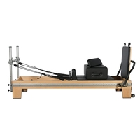 Reformer de Pilates professionnel en bois d'érable équilibré, couleur et logo personnalisables, équipement robuste pour l'entraînement au Pilates