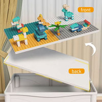 Nouveau produit éducatif très demandé : Ensemble de construction 104 pièces en plastique pour enfants, comprenant un circuit de dinosaures à assembler soi-même, des briques coulissantes, une table et des chaises