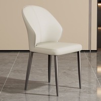Chaise de salle à manger moderne en cuir motif patte de chat, coutures verticales, dossier incurvé, pieds en métal foncé, pour salle à manger et cuisine