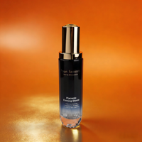 Ensemble de flacons de soin de la peau personnalisés de qualité supérieure 40/100/120ML Verre dégradé bleu foncé Bouchon doré Base taillée en diamant Emballage de sérum facial de luxe
