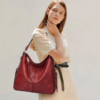 Vente en gros Sac à bandoulière rétro en cuir de haute qualité pour femmes Sac à main luxueux vintage en forme de croissant Accessoire de mode pour sans-abri