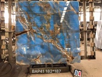 Revêtement mural extérieur décoratif de luxe dalles livre assorti bleu onyx marbre pour villa