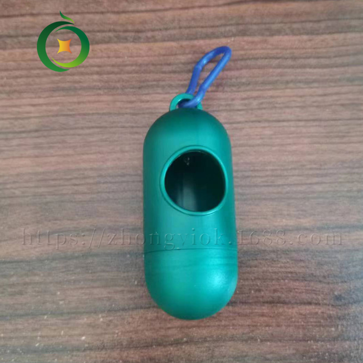 Distributeur de capsules vert foncé