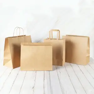 Alışveriş saplı çanta Kraft kağıt toptan özel Logo baskılı bakkal ambalaj zanaat kahverengi gravür baskı ekspres Zz