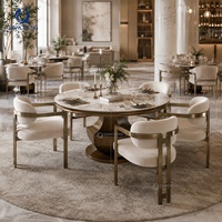 Table de salle à manger ronde moderne pour restaurant, plateau en pierre frittée, base en acier bronze brossé, pour projets hôteliers et villas, vente en gros directe usine