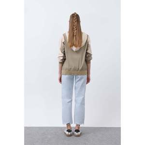 เสื้อโค้ทกันหนาวสำหรับผู้หญิง ยี่ห้อ Soul Brand ดีไซน์ทันสมัย พร้อมซิปตกแต่ง ให้ความอบอุ่นและสวมใส่สบาย เหมาะสำหรับสภาพอากาศหนาวเย็น สีเบจ-กากี - Product Image 4