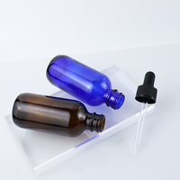 Vente en gros de flacon compte-gouttes d'huile essentielle en verre de Boston rond et ambré transparent de 30ml 60ml 100ml 120ml 2oz 4oz avec couvercles à vis