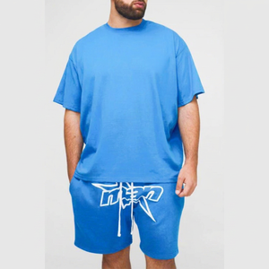 Ensemble de survêtement décontracté d'été respirant pour homme, comprenant un T-shirt ample à imprimé étoile en relief bleu et un short en jersey décontracté - Product Image 1