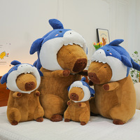 Vente en gros Peluche Capybara avec tête de requin amovible Costume Polyester doux Animal en peluche Coussin Capybara en peluche