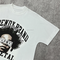 T-shirt graphique surdimensionné imprimé pour homme, coupe carrée, 100 % coton de haute qualité, fabriqué sur mesure en boîte, par un fabricant de t-shirts.