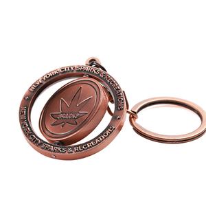 พวงกุญแจหมุนได้แบบสั่งทำจากโรงงาน รูปทรงกลม สีทอง สีเงิน ประดับด้วยเคลือบเงา ของที่ระลึกทางศาสนา - Product Image 6