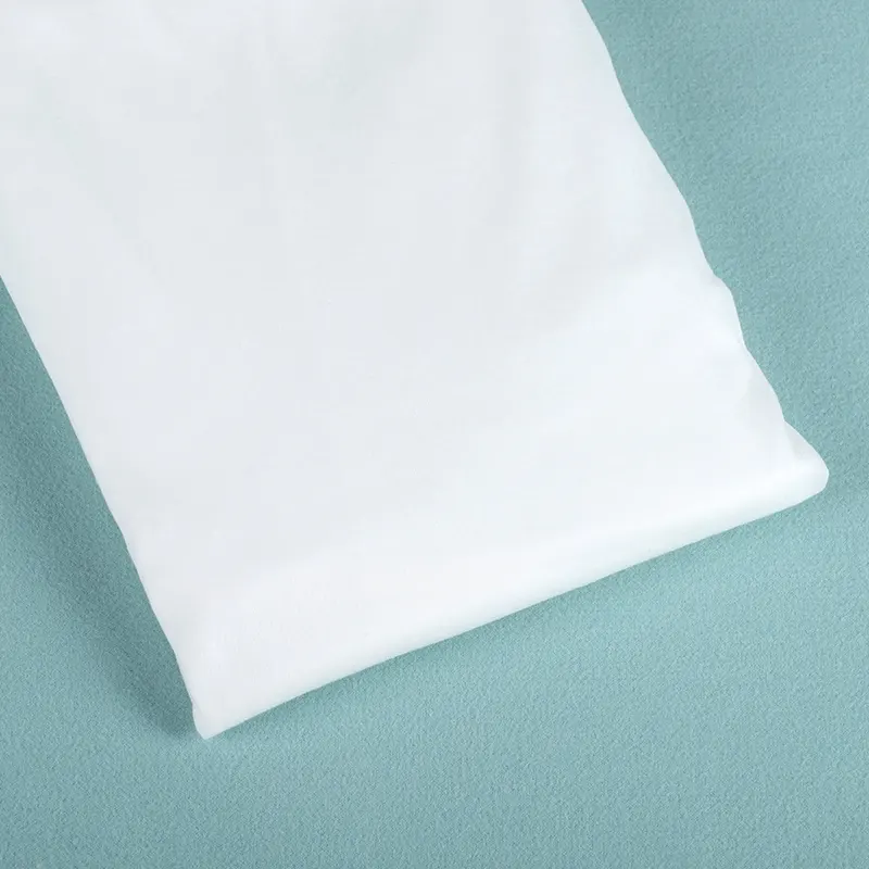 Factory Hot sell Customized 100% viscose pearl spunlace nonwoven fabric rolls Hydrophobic original Material face towel wet wipes