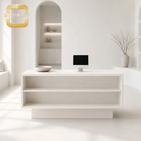 Comptoir de réception commercial personnalisé avec surface imperméable et style épuré pour salon de beauté haut de gamme