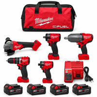 Ensemble d'outils électriques sans fil Milwaukee E 18V : perceuse-visseuse, meuleuse d'atelier, clé à couple élevé, quatre batteries, chargeur, sac