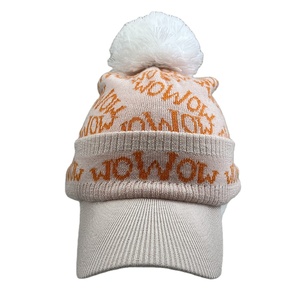 2025 nouveau Design Jacquard logo <span class=keywords><strong>tricot</strong></span>é chapeau d'hiver à la mode de haute qualité 100% laine plié <span class=keywords><strong>pompon</strong></span> <span class=keywords><strong>bonnet</strong></span> avec visière - Product Image 1