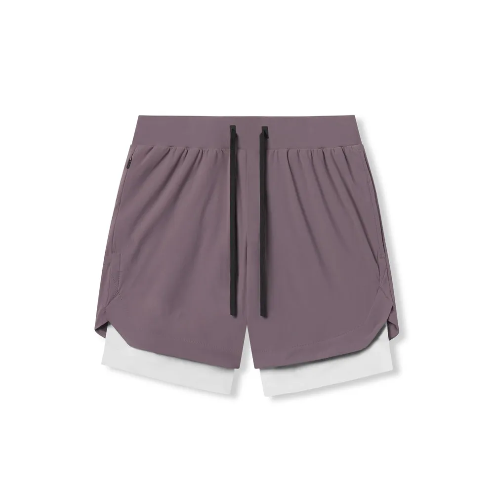 Fabricant de shorts de course à séchage rapide pour hommes de 7 pouces avec poche à fermeture éclair taille élastique shorts de fitness pour exercices d'athlétisme