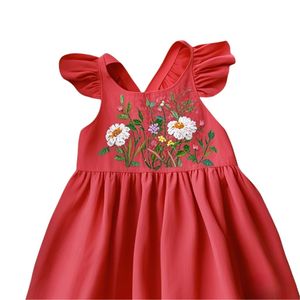 Abito da bambina a tinta unita con decorazioni floreali, in cotone ecologico, a maniche corte, modello a trapezio, traspirante, estivo. - Product Image 1