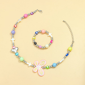 Ensemble collier et bracelet croix perlée en forme de papillon pour femmes, bijoux décontractés à la mode, en alliage de Zinc, motif cœur multicolore - Product Image 1