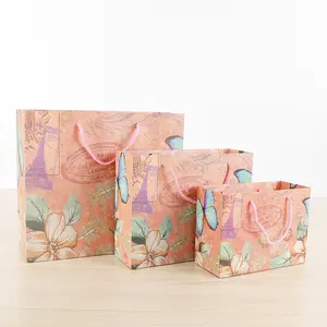도매 핑크 종이 의류 포장 광고 선물 가방 꽃 디자인