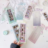 Porte-cartes long transparent en PVC à paillettes, à quatre compartiments, avec pendentif ailes d'ange pour fan de fille, marque-page