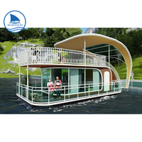 Maison en bateau flottant de luxe, conteneur d'hôtel en eau