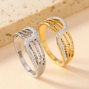 Bague de luxe en acier inoxydable, creuse, multicouche, incrustée de diamants, anti-décoloration, plaquée or 18 carats - Product Image 1