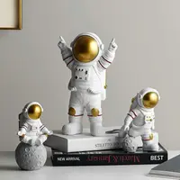 home decor artificial resin astronaut figurines modern spaceman with moon sculpture statues decorative arts and crafts for kids