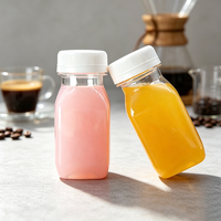 Bouteille vide carrée en plastique PET transparente de 100 ml (3,4 oz) pour café infusé à froid ou jus d'orange, avec bouchons blancs transparents