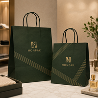 Sac de shopping haut de gamme avec logo en feuille d'or et papier vert foncé pour l'emballage de marques de cosmétiques de mode HONPAK