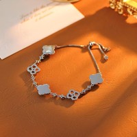 Bracelet trèfle porte-bonheur plaqué argent, tendance transfrontalière, avec chaîne ajustable, zircon brillant et coquille blanche