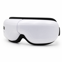 Masque de massage oculaire chauffant JY008 en gros avec pression d'air, vibration et musique, appareil de soin des yeux Type C OEM