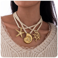 Collier tendance d'été en acier inoxydable plaqué or 18 carats PVD avec pendentifs coquillage, étoile de mer et soleil, chaîne corde et perles