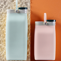Bouteille d'eau de sport en silicone sans BPA, design créatif personnalisé en gros, toucher doux, bouteille pliable