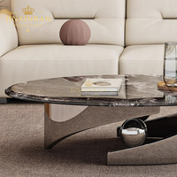 Table basse de salon moderne italienne de luxe léger, avec pieds en acier inoxydable argenté et plateau en pierre frittée ovale