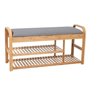 A three-tiered bamboo <b>shoe</b> <b>rack</b> in the hallway and a natural <b>shoe</b> <b>storage</b> solution for the living room. - Product Image 1