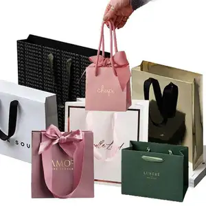 Gran oferta, bolsas de compras de papel de regalo de boutique de mármol de oro rosa con cuerda blanca de lujo impresas personalizadas con su propio logotipo