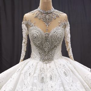 Robe de mariée moderne sur mesure pour la mariée, col montant, manches longues, dentelle perlée, fleurs en cristal, traîne cathédrale, coupe princesse - Product Image 1