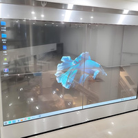 Écran intelligent LED pliable à haute transparence et pleine couleur avec SDK pour la publicité sur les murs en verre intérieurs, léger