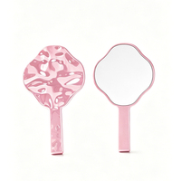 Miroir de maquillage portable Lucky Clover rose, finition argentée ondulée en métal liquide à quatre feuilles pour femmes, logo personnalisé ODM OEM